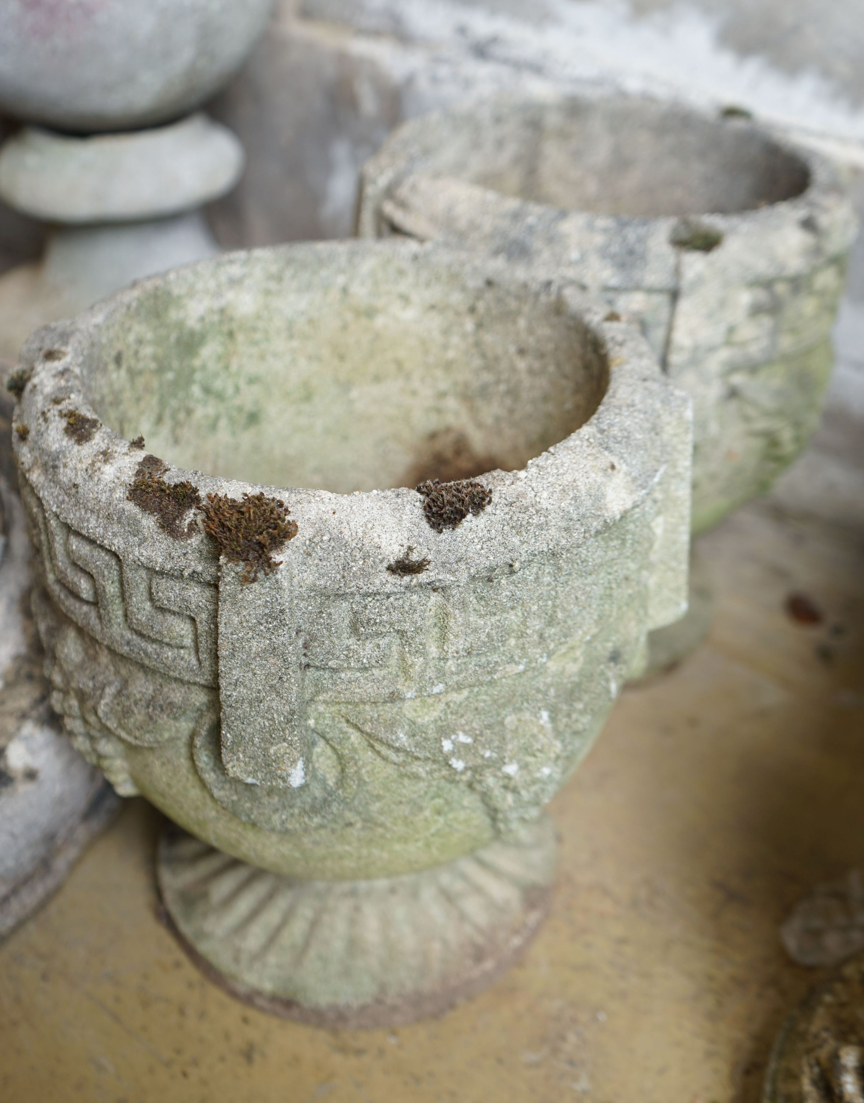 A pair of circular reconstituted garden planters, diameter 22cm